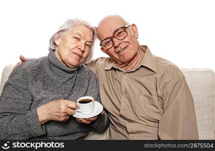 Happy senour couple drinking coffee