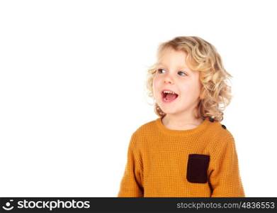 Happy small blond child whith yellow jersey isolated on a white background