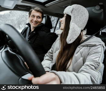 happy smiley couple together car while road trip