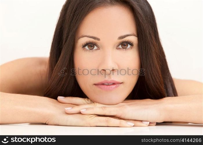 Happy Smiling Beautiful Woman Resting on Her Hands