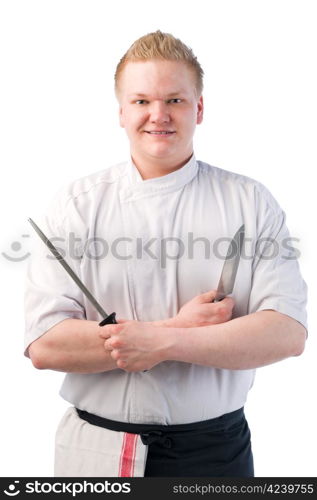 Happy smiling cook holding knife and sharpener