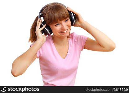 Happy smiling girl dancing and listening to music