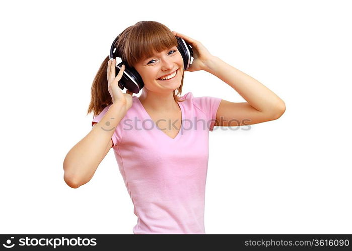 Happy smiling girl dancing and listening to music