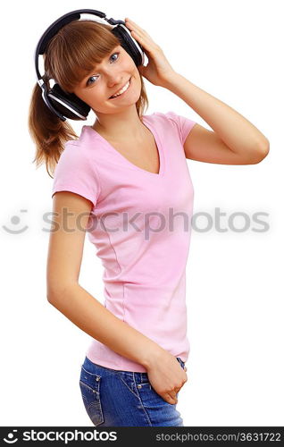 Happy smiling girl dancing and listening to music