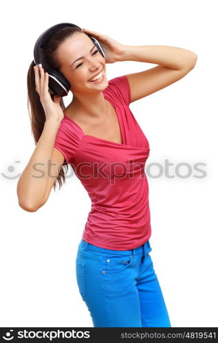 Happy smiling girl dancing and listening to music