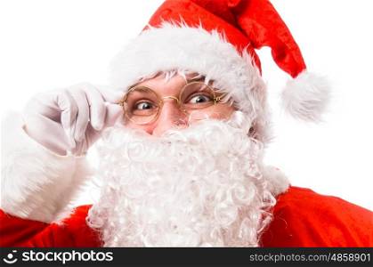 Happy smiling Santa Claus holding glasses and looking at camera, isolated on white