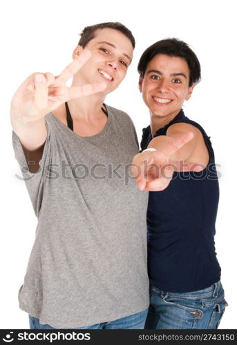 happy smiling sisters showing victory hand sign, isolated on white background