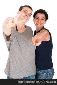 happy smiling sisters showing victory hand sign, isolated on white background