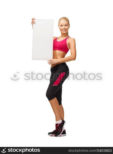 happy smiling sportswoman with white blank board