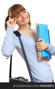 Happy smiling student standing and holding books