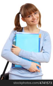 Happy smiling student standing and holding books