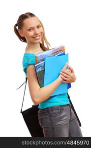 Happy smiling student standing and holding books