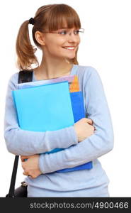 Happy smiling student standing and holding books