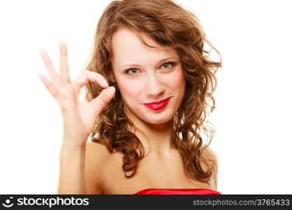 Happy smiling woman curly hair showing ok sign gesture isolated on white background