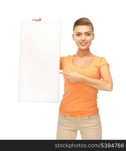 happy smiling woman pointing at white blank board