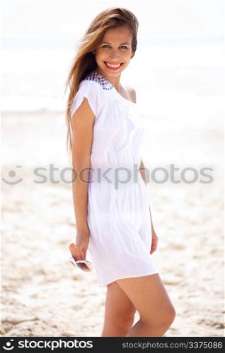 happy smiling women on the beach,vertical shot