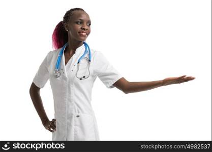 Happy smiling young beautiful african female doctor showing blank area for sign or copyspace isolated over white background