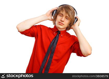 Happy smiling young man dancing and listening to music