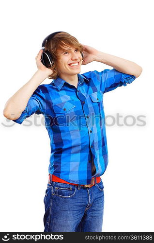 Happy smiling young man dancing and listening to music