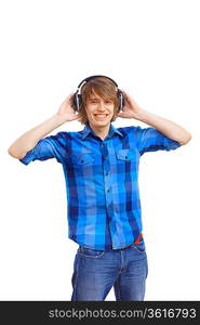 Happy smiling young man dancing and listening to music