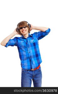 Happy smiling young man dancing and listening to music