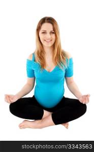 Happy smiling young pregnant woman practicing yoga meditation exercise, isolated over white background.