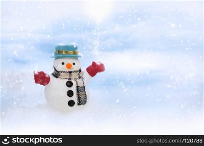 Happy snowman is standing in winter christmas landscape, Merry Christmas and happy New Year concept.