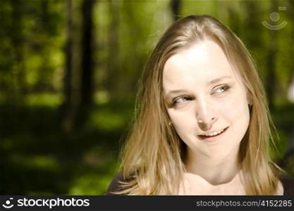 Happy Spring Time. Woman Smiling In The Forest.