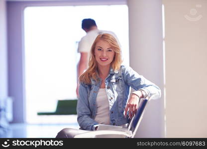 happy student girl working on laptop computer at modern school university indoors