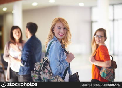 happy student girl working on tablet computer at modern school university indoors