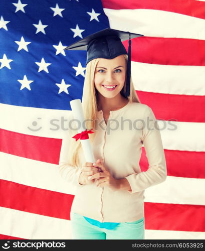 happy student in graduation cap with certificate over american flag. student in graduation cap with certificate