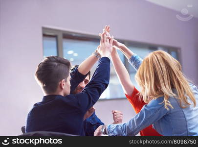 happy students celebrate, friends group together at school, young people raise hands, stack and get in circle formation together