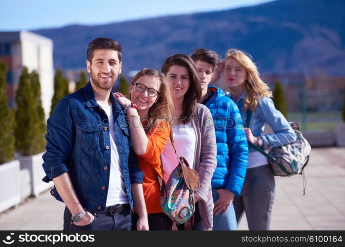 happy students group have fun outdoor in university campus park