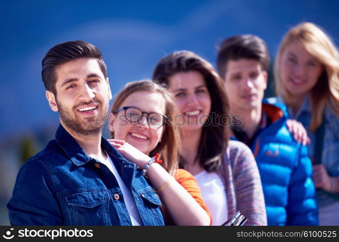 happy students group have fun outdoor in university campus park