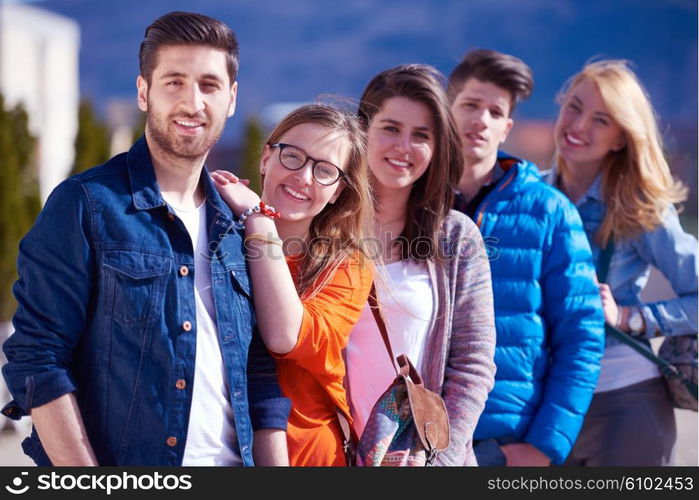 happy students group have fun outdoor in university campus park