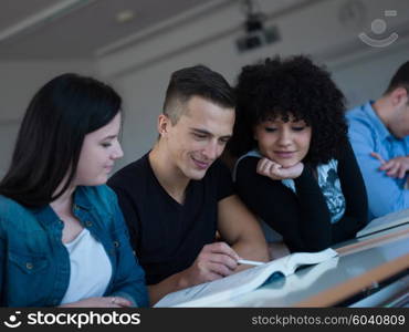 happy students group study in classroom