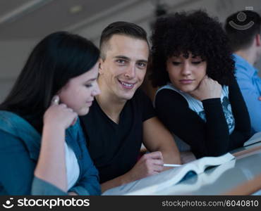 happy students group study in classroom