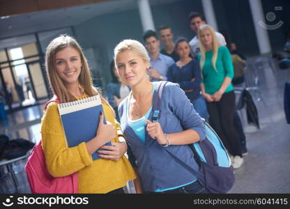 happy students group study in classroom