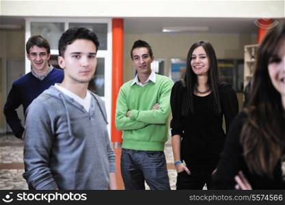 happy students people group portrait at university indoor building
