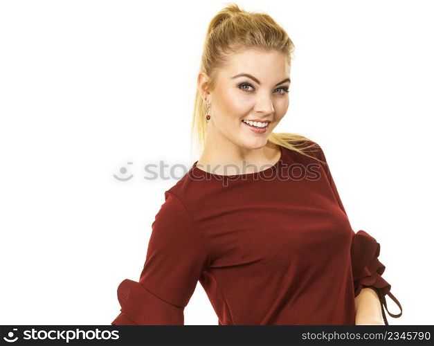Happy stylish woman wearing top with long sleeve decorated by massive flounces. Fashion, clothing style concept.. Stylish woman wearing burgundy top