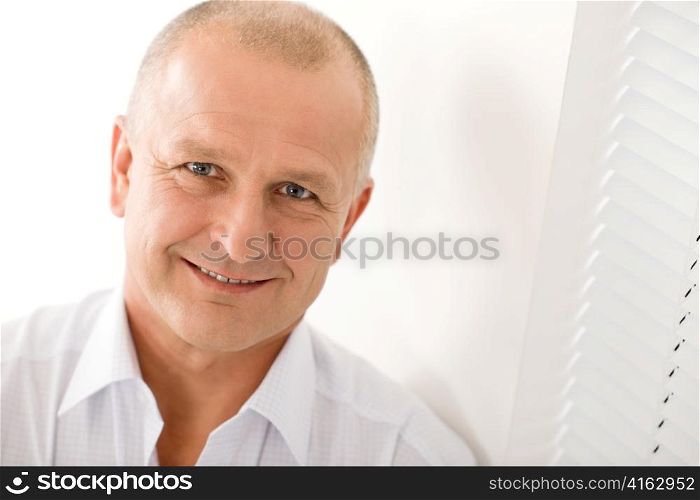 Happy successful mature businessman professional close-up portrait smiling white background
