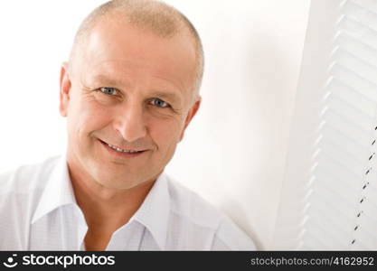Happy successful mature businessman professional close-up portrait smiling white background