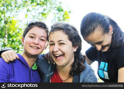 happy teen girls group outdoor have fun