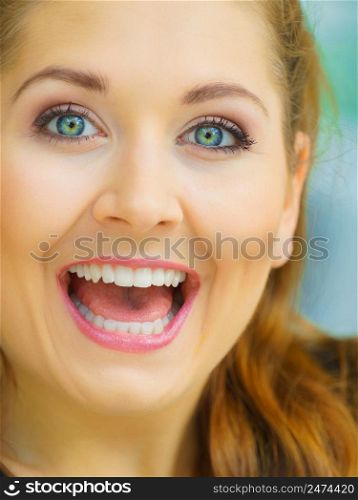 Happy teen woman enjoying her leisure time. Female having big toothy smile. Happy beautiful young teenager woman