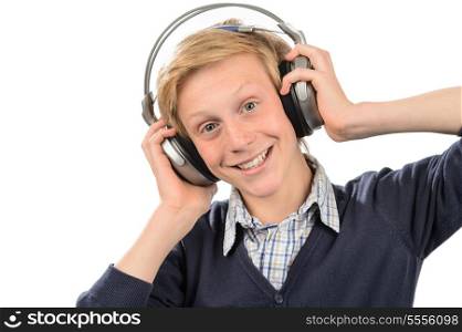 Happy teenage boy listening to music against white background