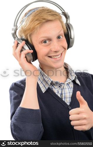 Happy teenage boy thumb-up wear headphones listening to music isolated