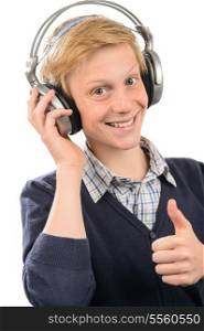 Happy teenage boy thumb-up wear headphones listening to music isolated
