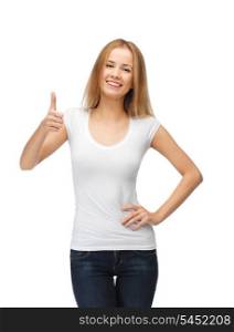 happy teenage girl in blank white t-shirt with thumbs up