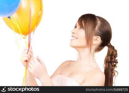 happy teenage girl with balloons over white