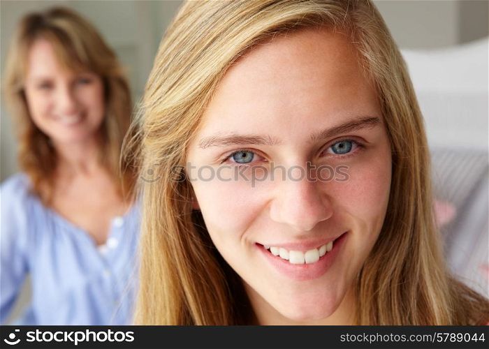Happy teenage girl with mother